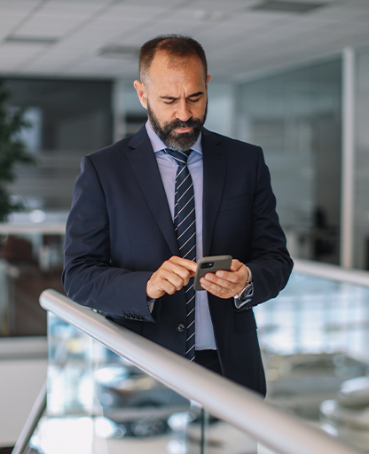 Trusted internal users on phone in dealership office