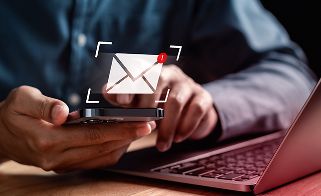 Person checking email on their phone