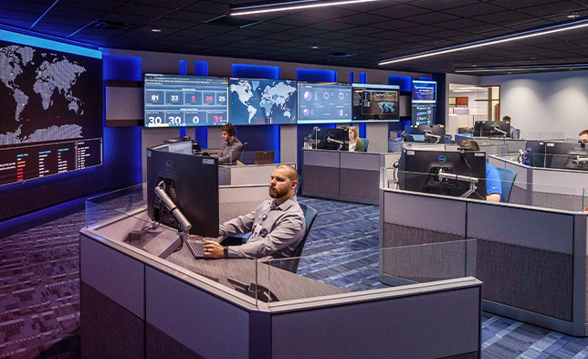 Cyber security team in an SOC monitoring networks