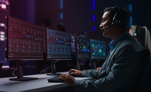 Cybersecurity specialist on a call at the SOC